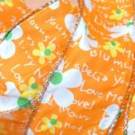 Rollo Cinta Textil Flor/Letras Naranja - 60mm x 20m