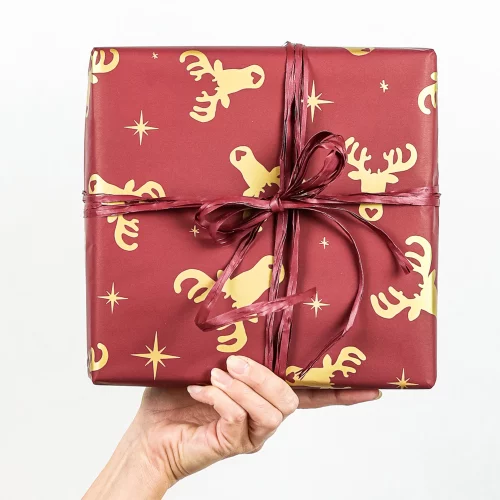 papel regalo renos de navidad dorados